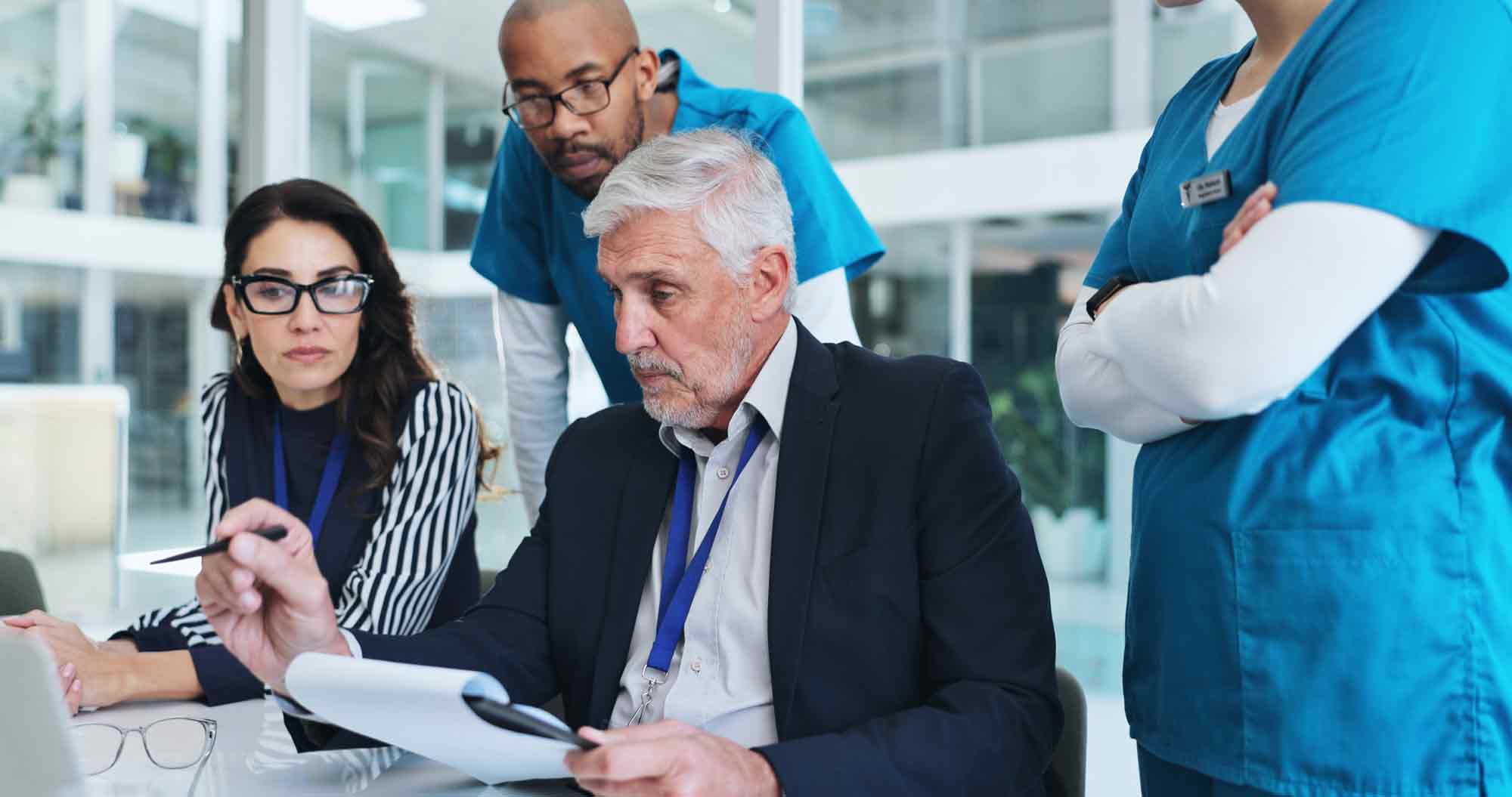 Healthcare operations team reviewing revenue cycle processes